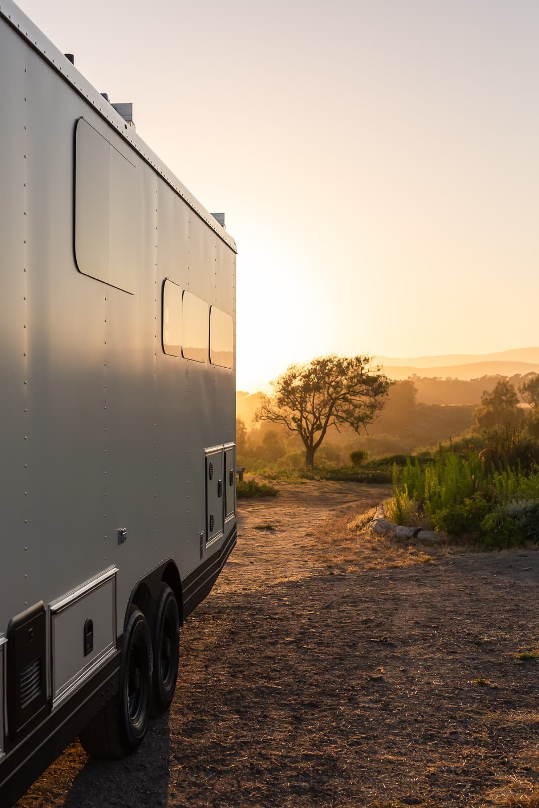 Living Vehicle Travel Trailer Parked With Sunset