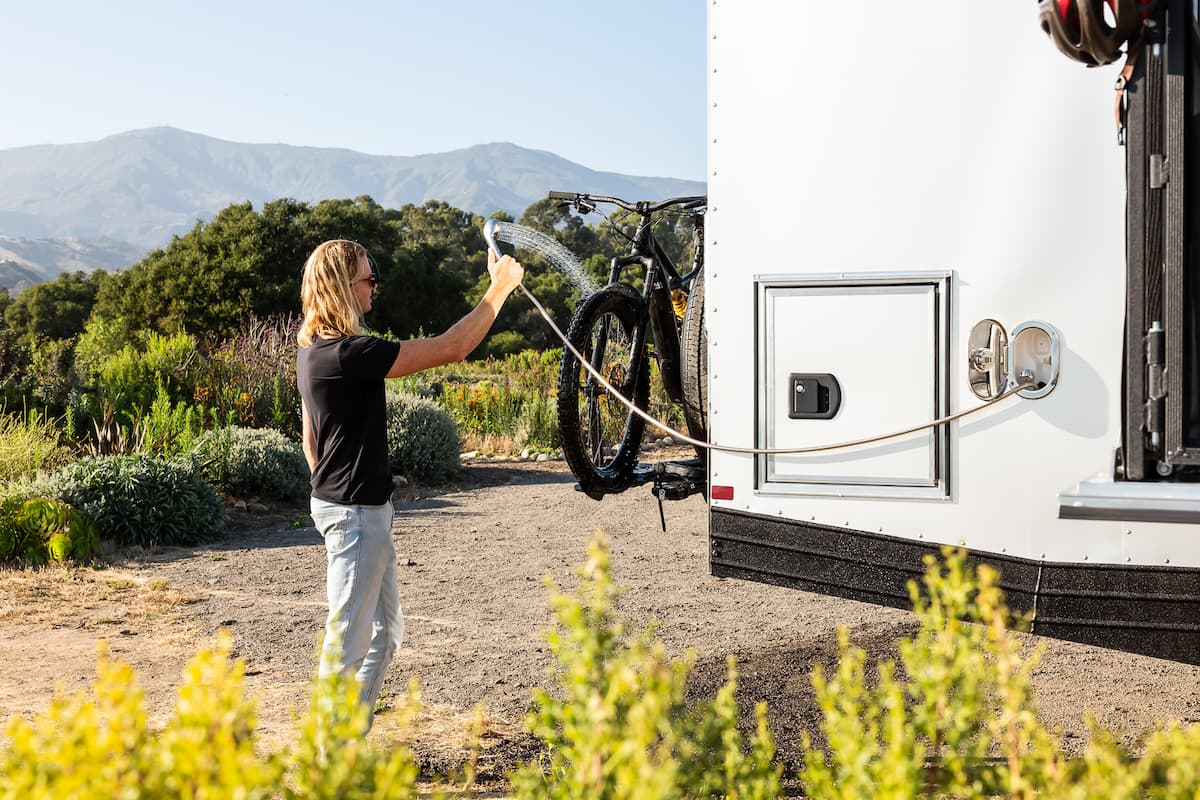 washing a luxury travel trailer
