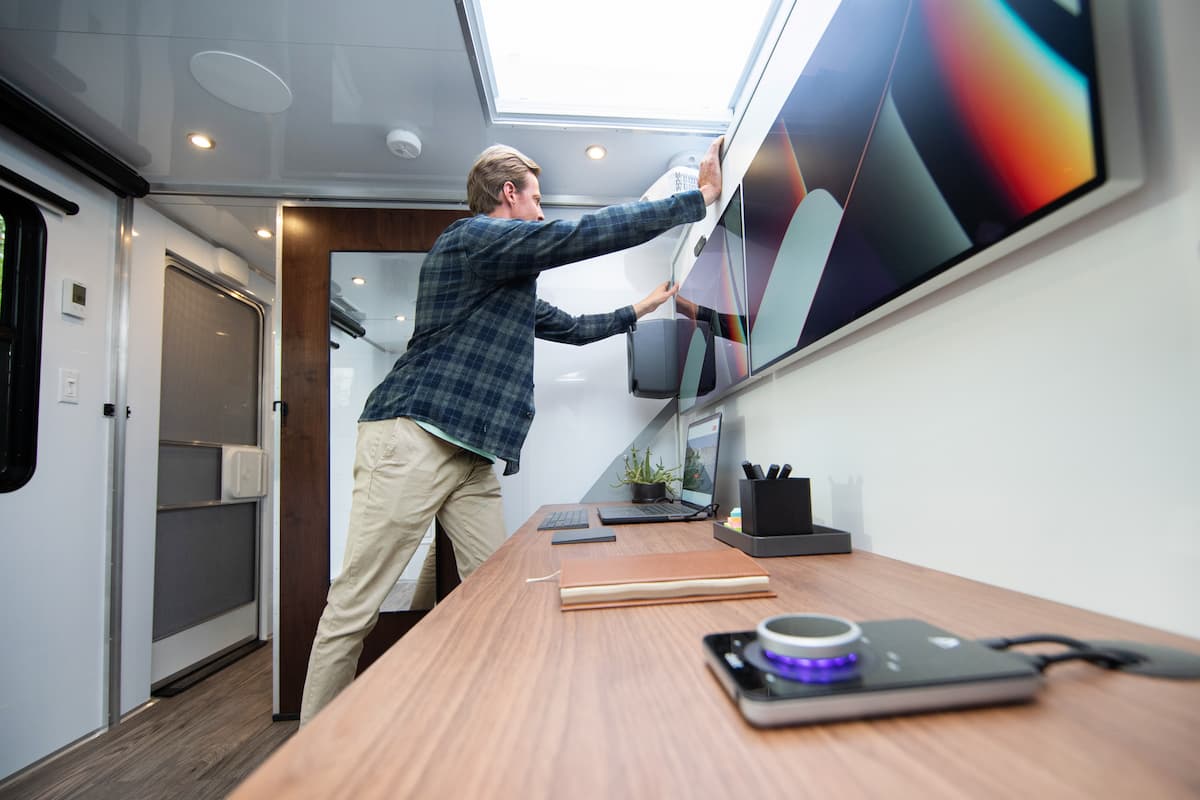 Full Sized RV Office with side by size monitors and 80" desk