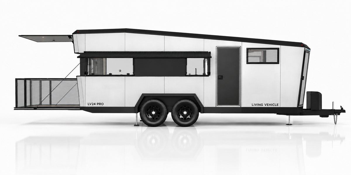 Side elevation of an LV Line PRO travel trailer with its deck and awnings open
